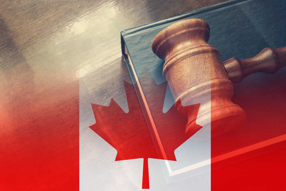 Canadian,laws,concept.,judge,gavel,with,legal,book,with,flag